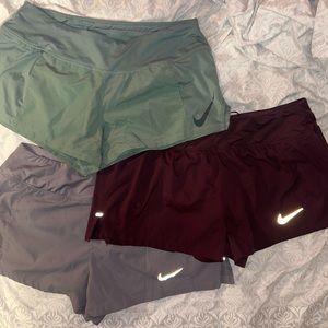 Nike women’s medium running short package 3 for 45